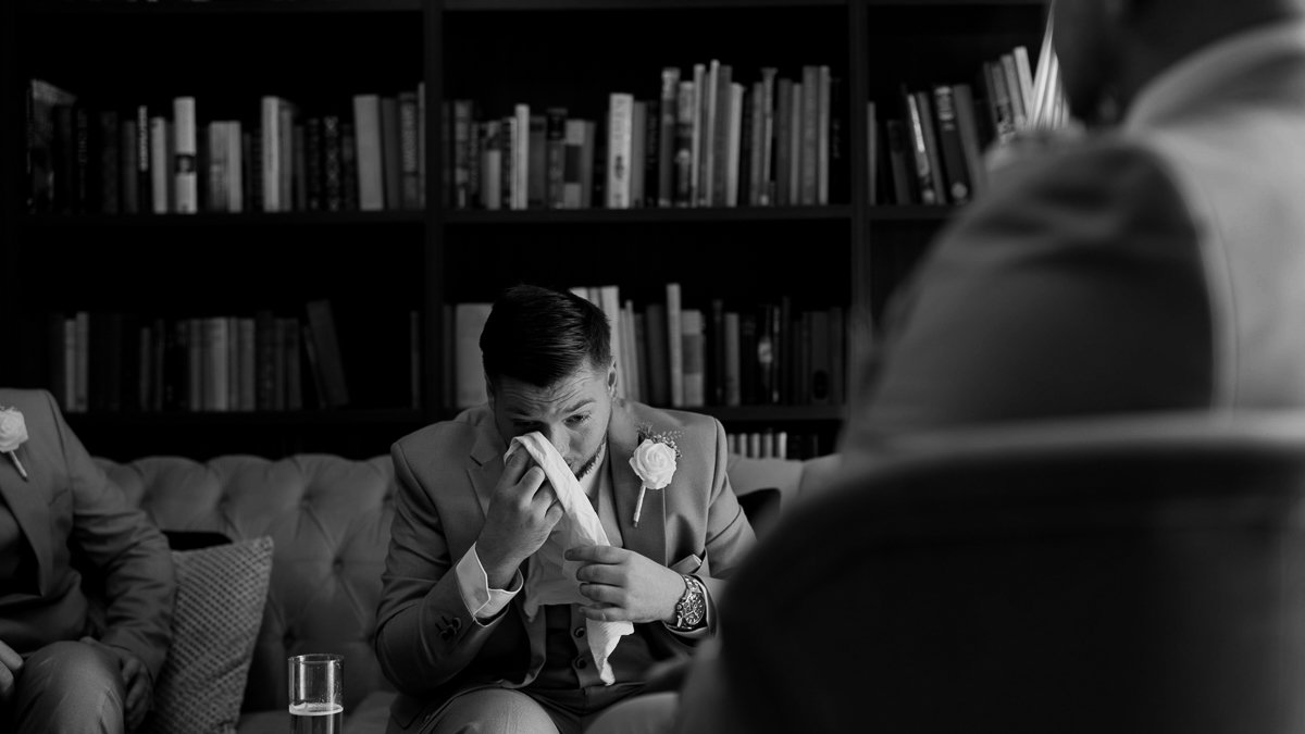 Groom captured crying whilst reading a letter from his bride