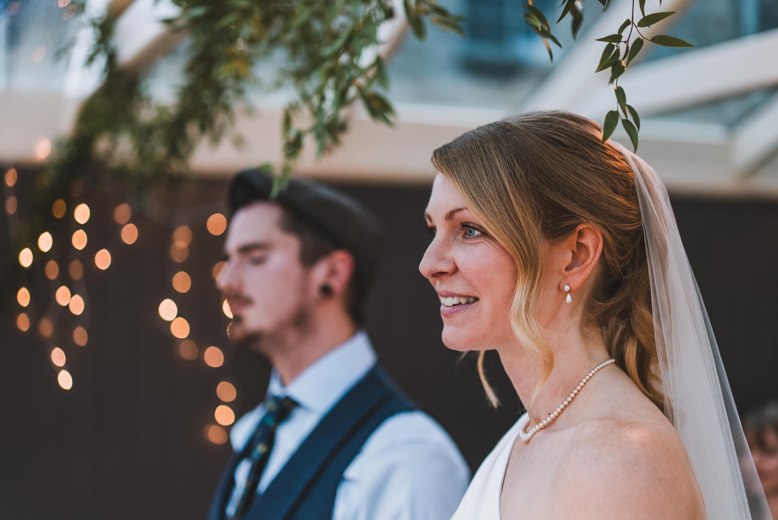 Bride and groom during the ceremony at this Burford wedding in Oxfordshire