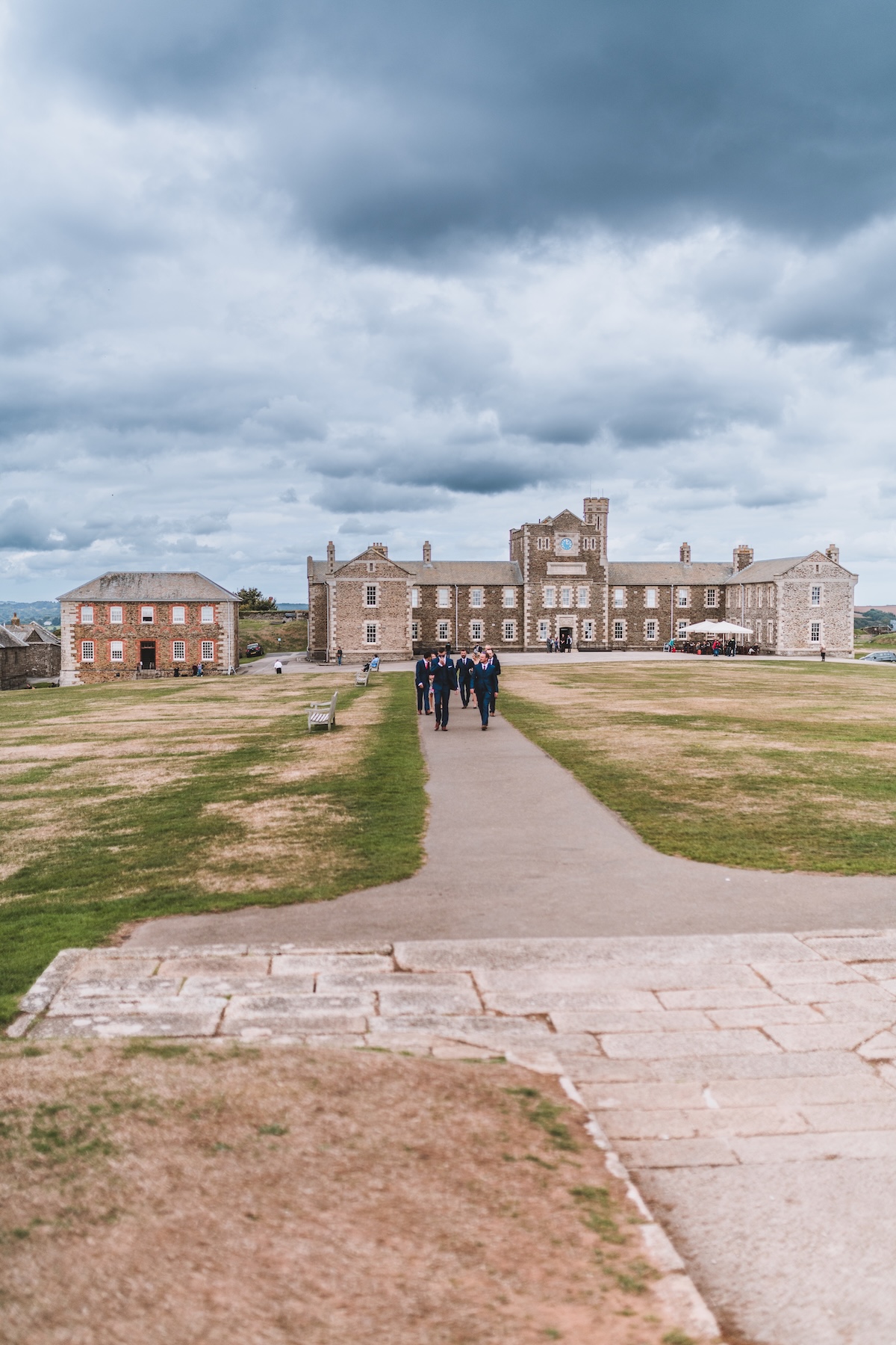 Wedding guests arriving at Pendennis Castle in Cornwall