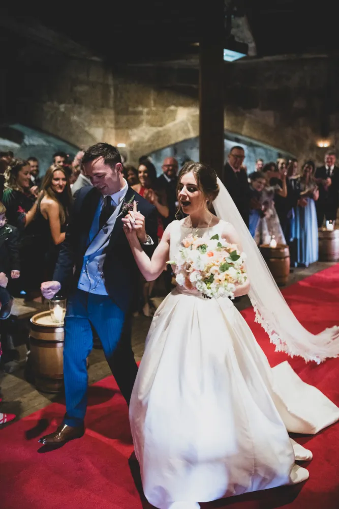 Bride and Groom dancing down the aisle Bride and Groom dancing down the aisle