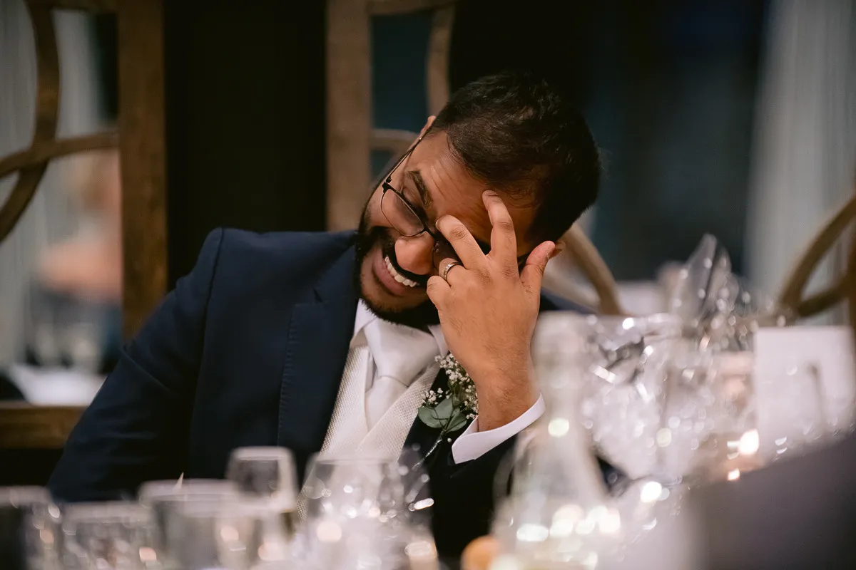 Grooms in hysterics during the best man speech Grooms in hysterics during the best man speech